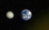 Earth and moon in space, distant sun on the right.