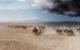 Horses running across a desert under dark storm clouds.